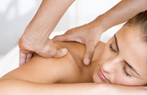 woman receiving shoulder massage